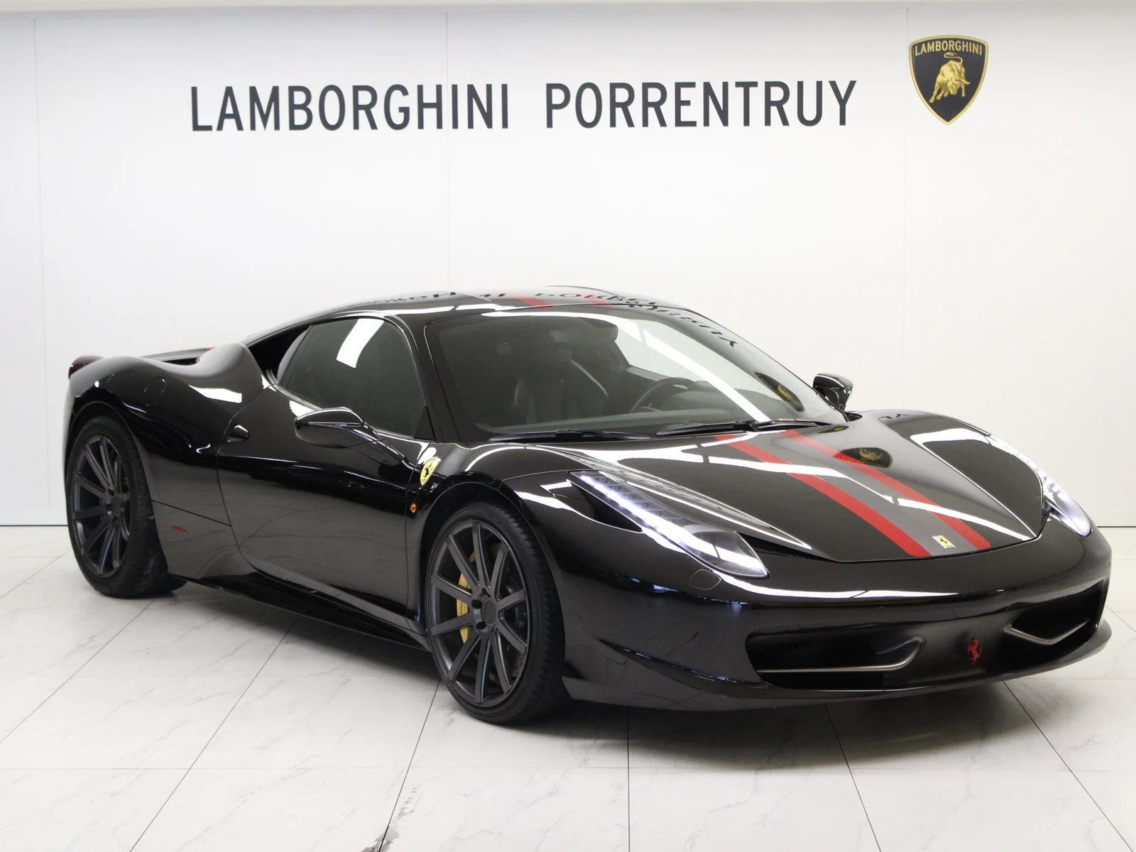 Black Ferrari 458 Italia, full front three-quarter view