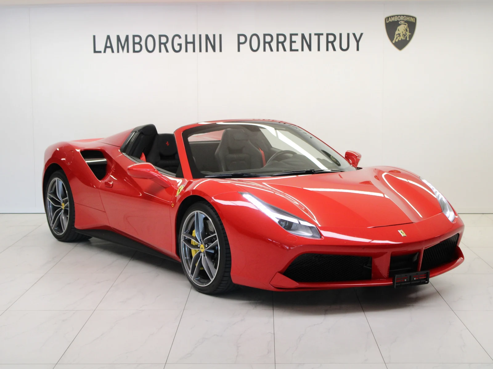 Red Ferrari 488 Spider, full front three-quarter view