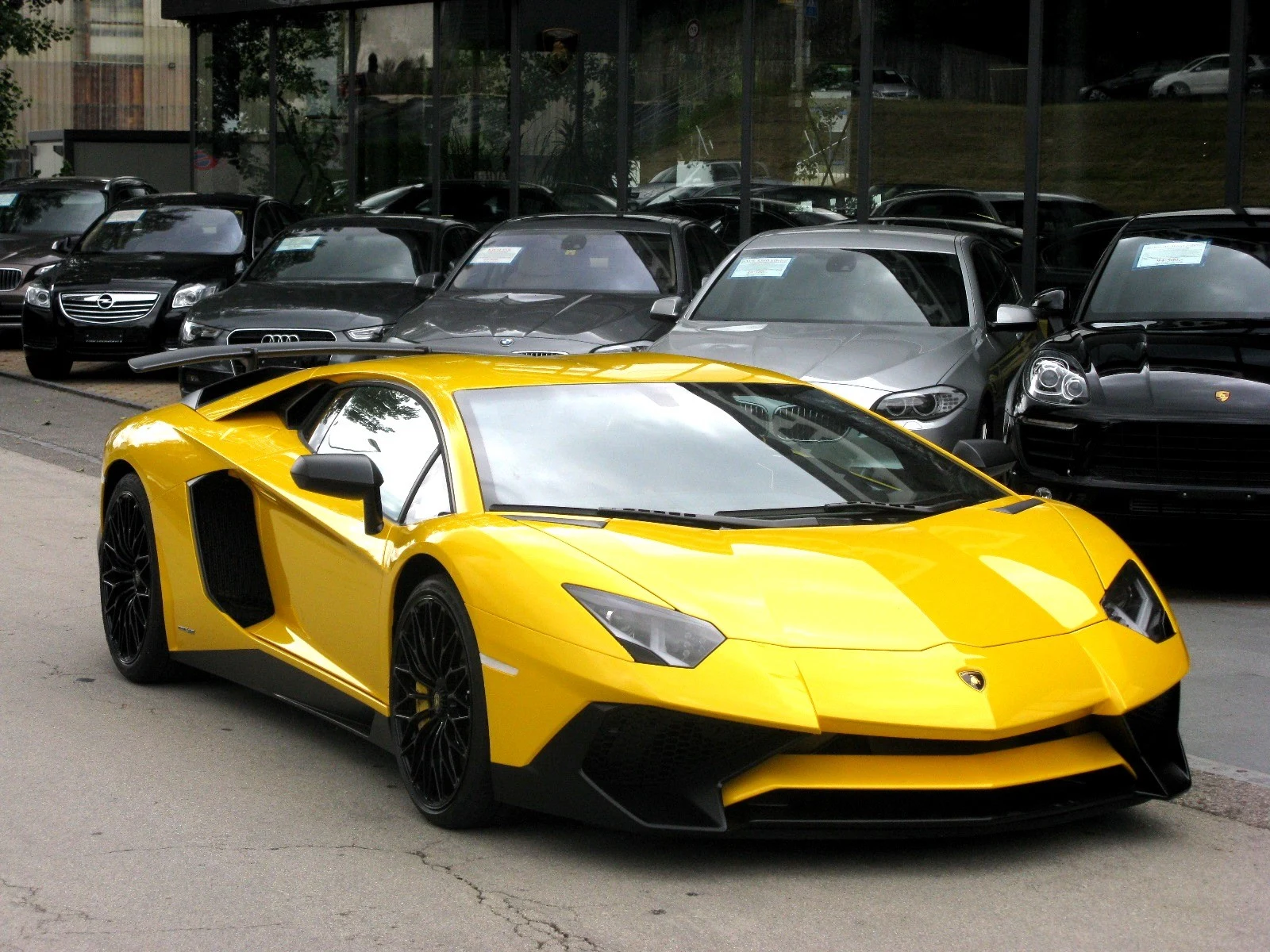 Yellow Lamborghini Aventador LP 750-4 SV, full front three-quarter view