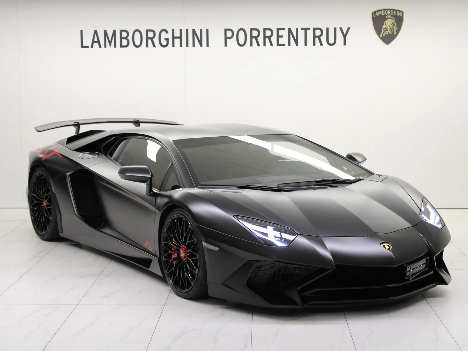 Black Lamborghini Aventador LP 750-4 SV, full front three-quarter view