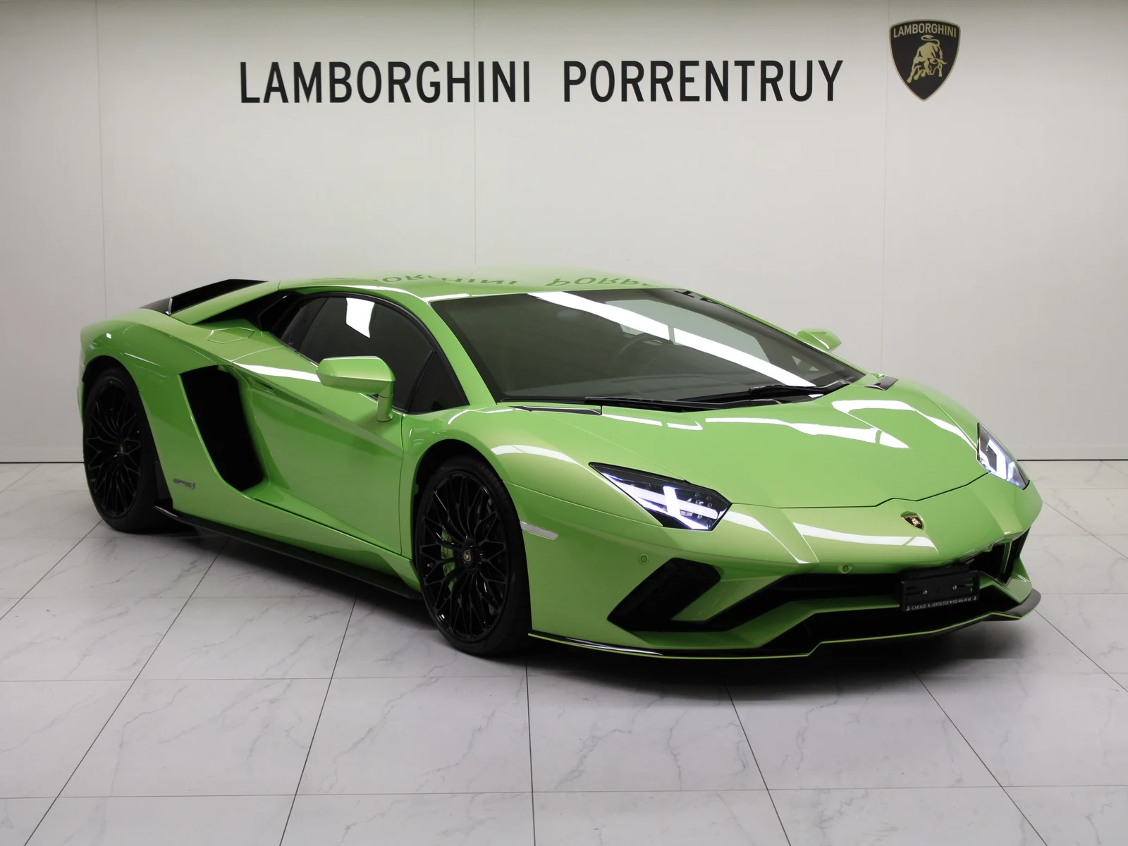 Green Lamborghini Aventador S, full front three-quarter view