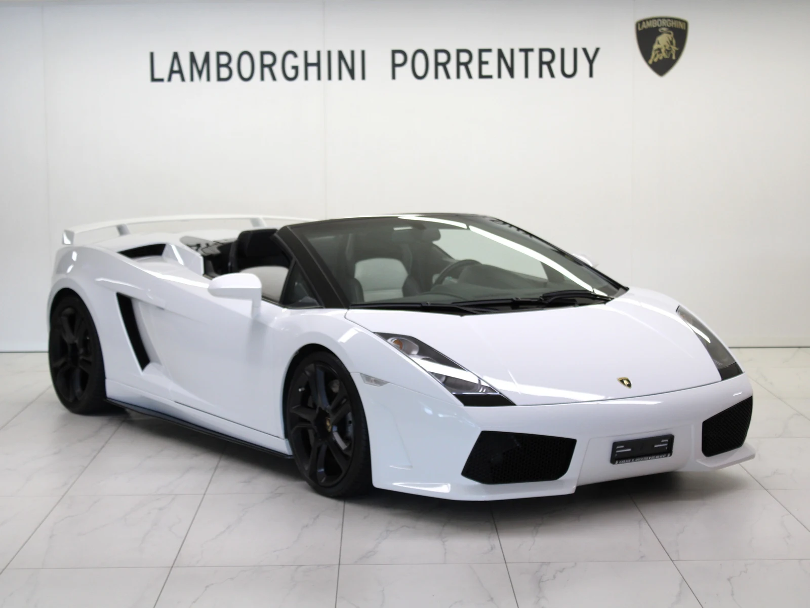 White Lamborghini Gallardo Spyder, full front three-quarter view