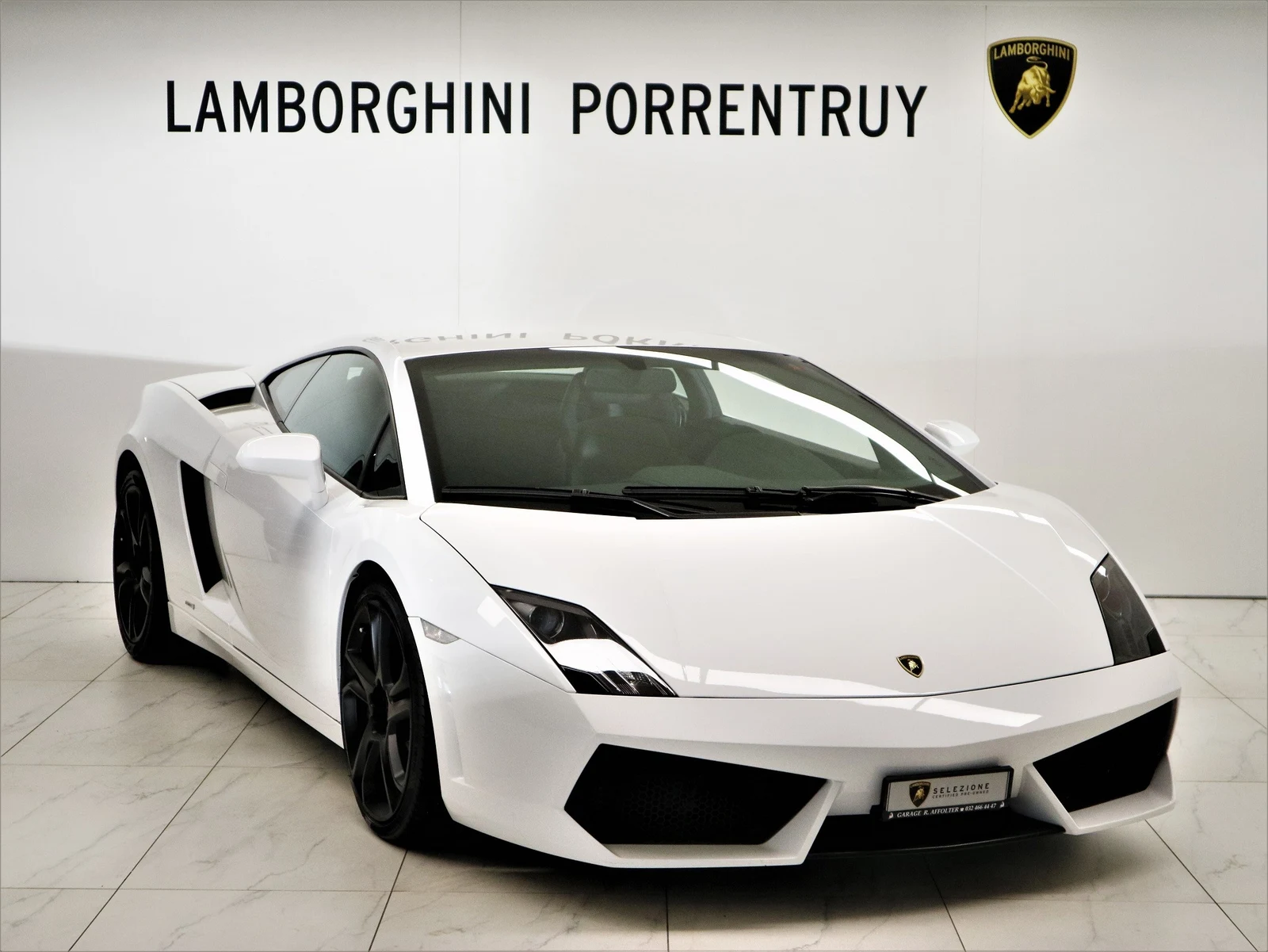 White Lamborghini Gallardo LP 560-4, full front three-quarter view
