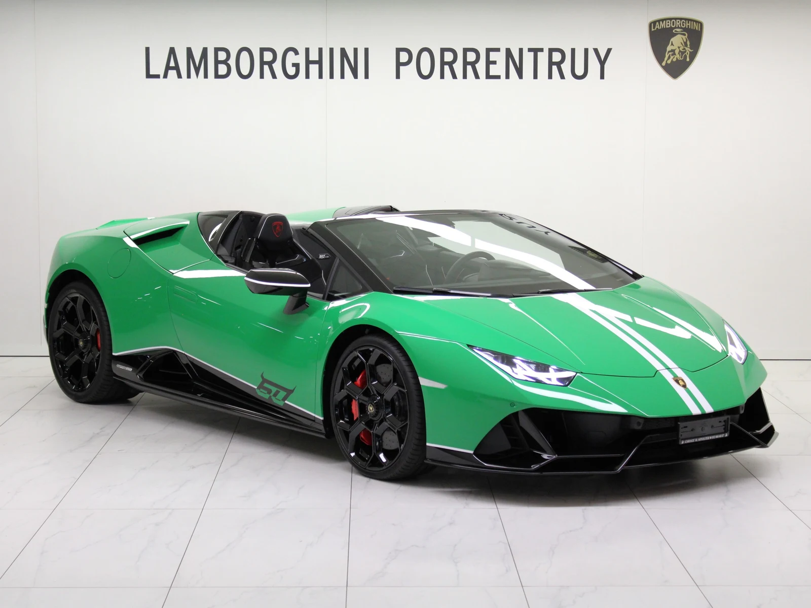 Green Lamborghini Huracán EVO Spyder 60th Anniversary, full front three-quarter view