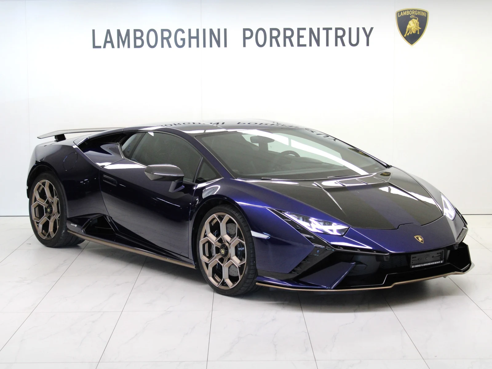 Blue Lamborghini Huracán Tecnica, full front three-quarter view