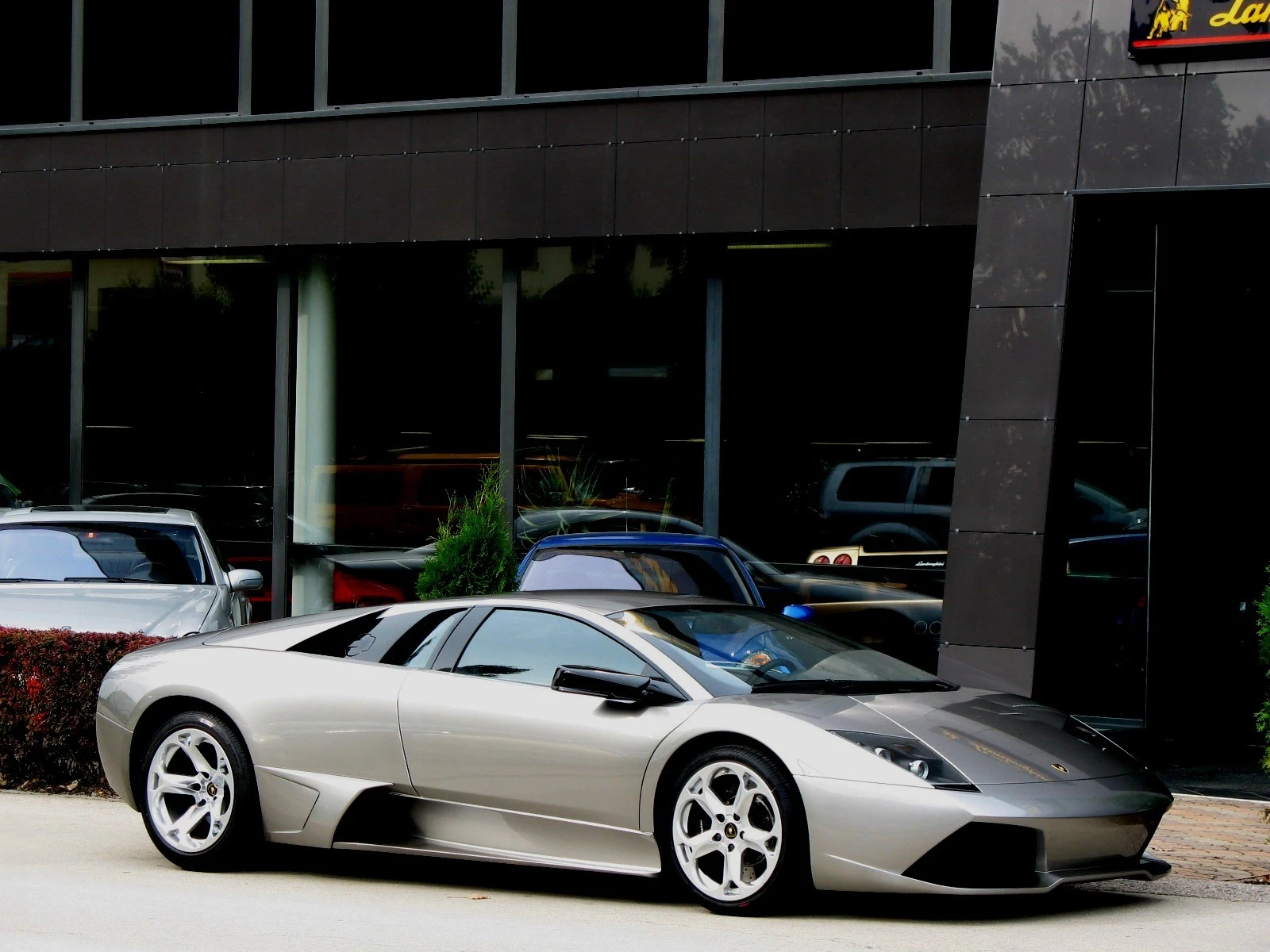 Gray Lamborghini Murciélago LP 640, full front three-quarter view