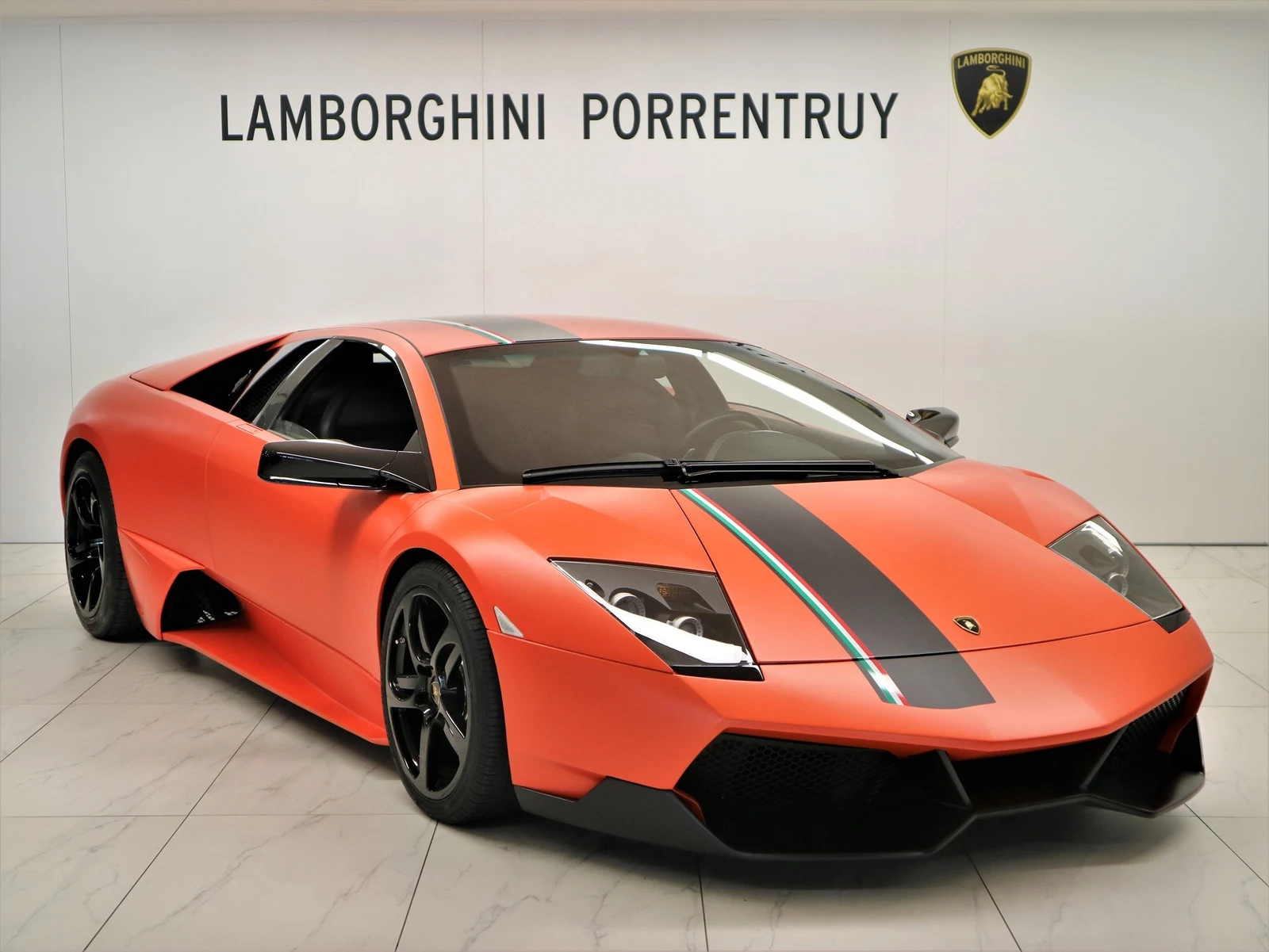 Orange Lamborghini Murciélago LP 640, full front three-quarter view
