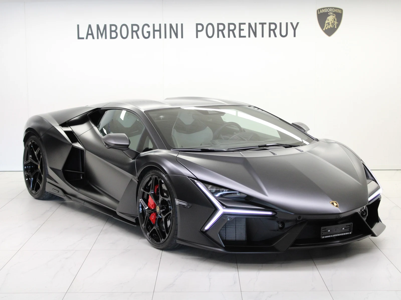Black Lamborghini Revuelto, full front three-quarter view