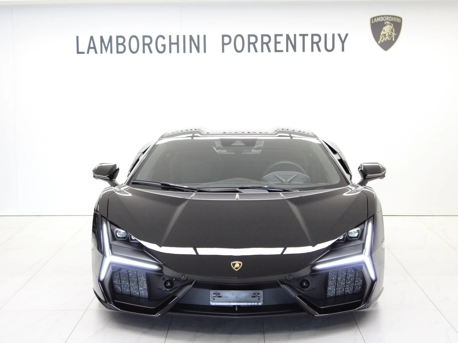 Black Lamborghini Revuelto, full front view