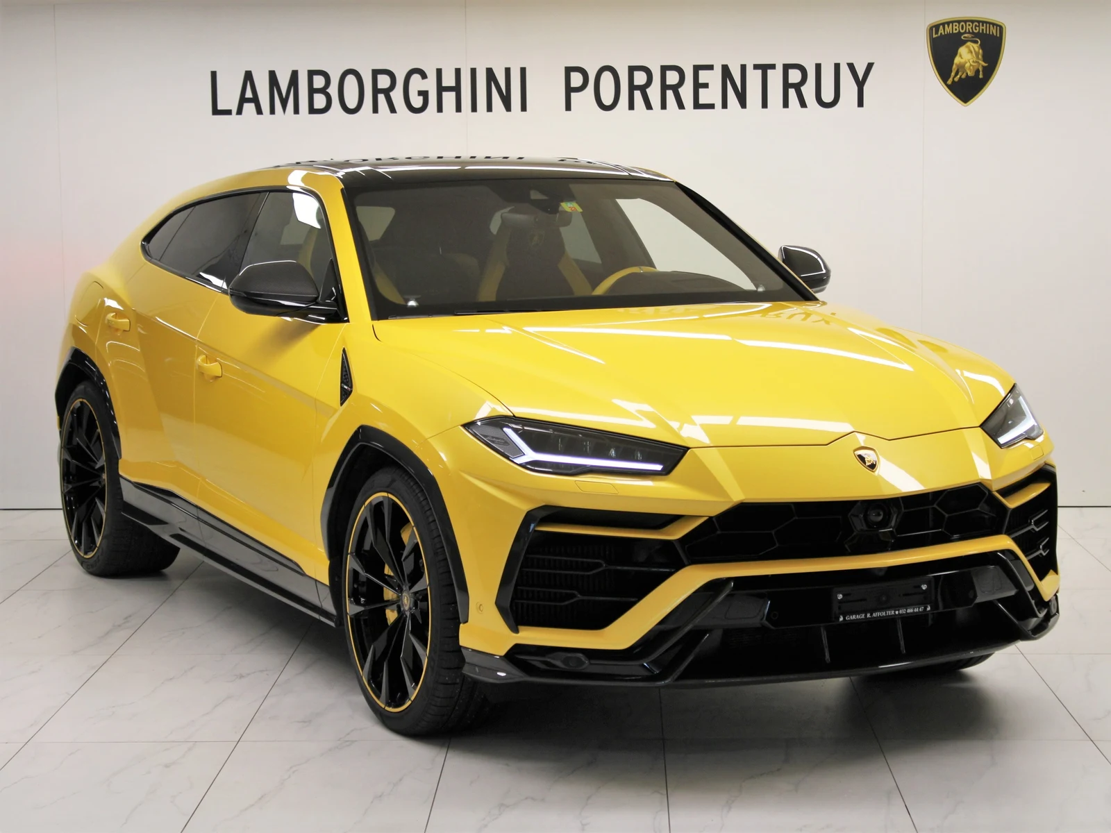 Yellow Lamborghini Urus Pearl Capsule, full front three-quarter view