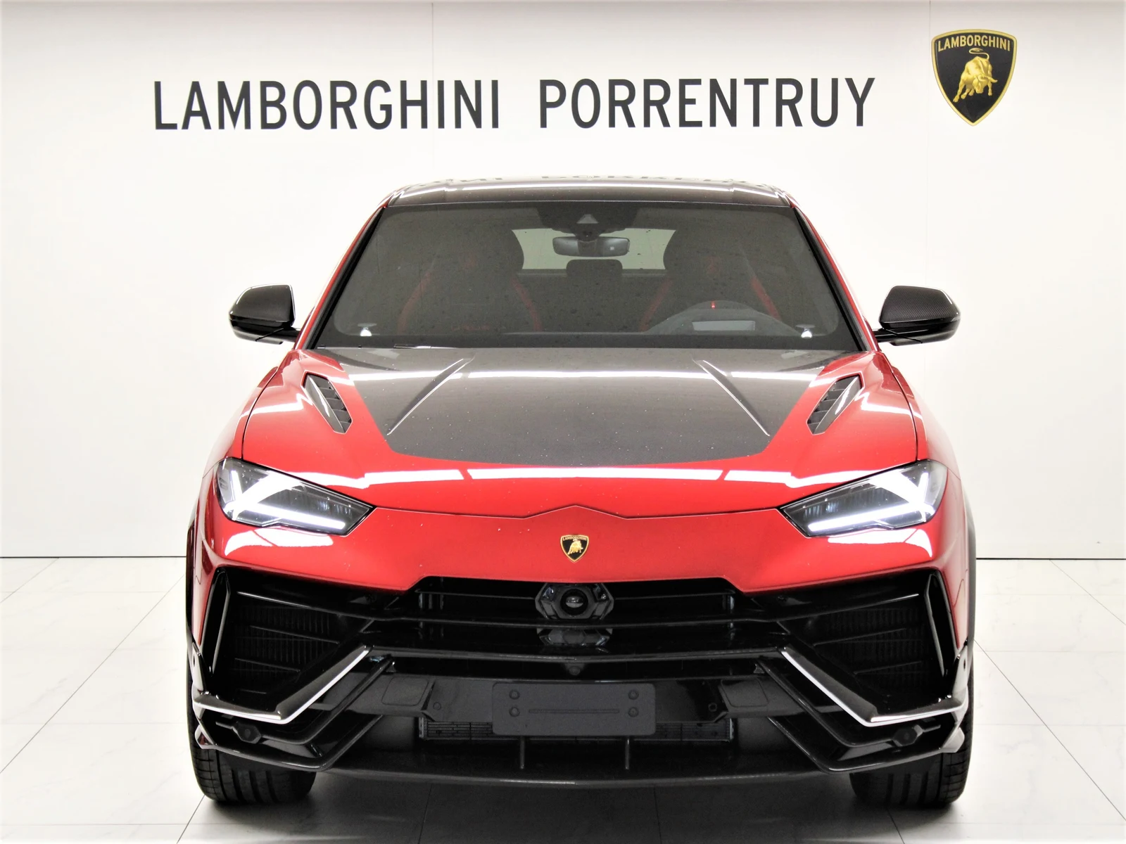 Red Lamborghini Urus Performante, full front three-quarter view