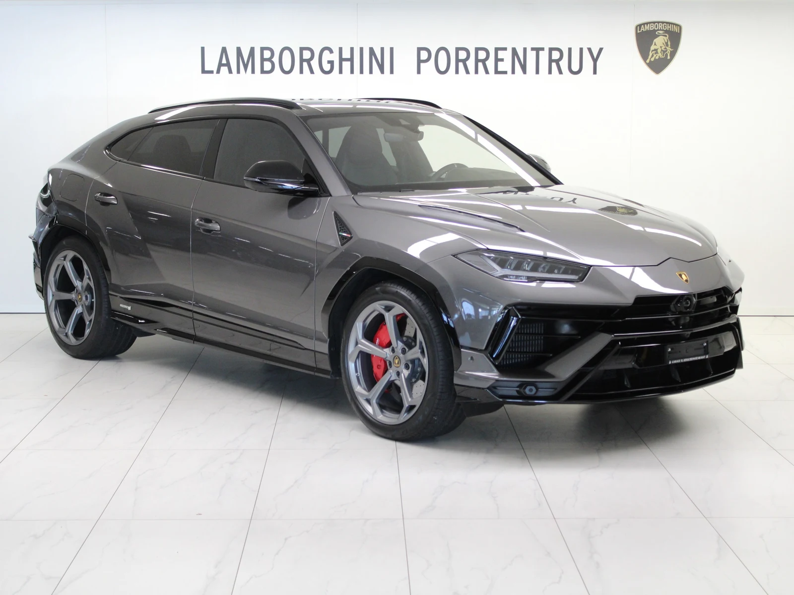 Anthracite gray Lamborghini Urus S, full front three-quarter view