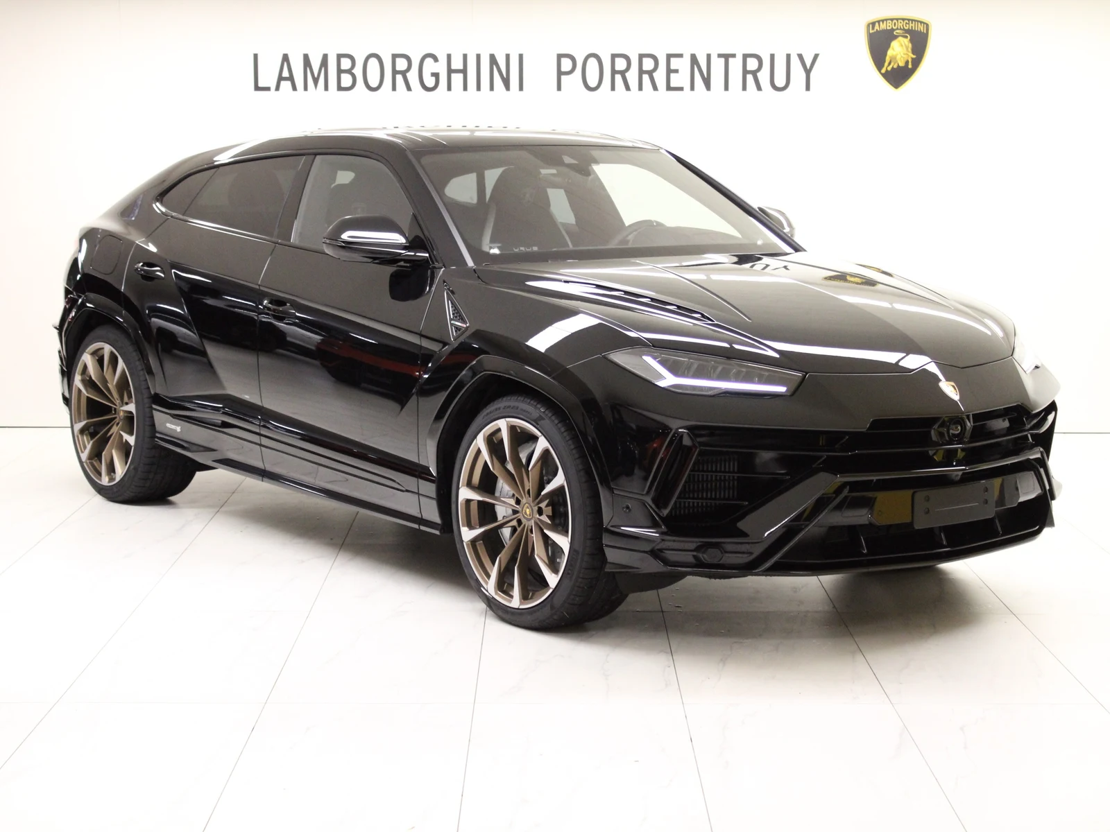 Black Lamborghini Urus S, full front three-quarter view