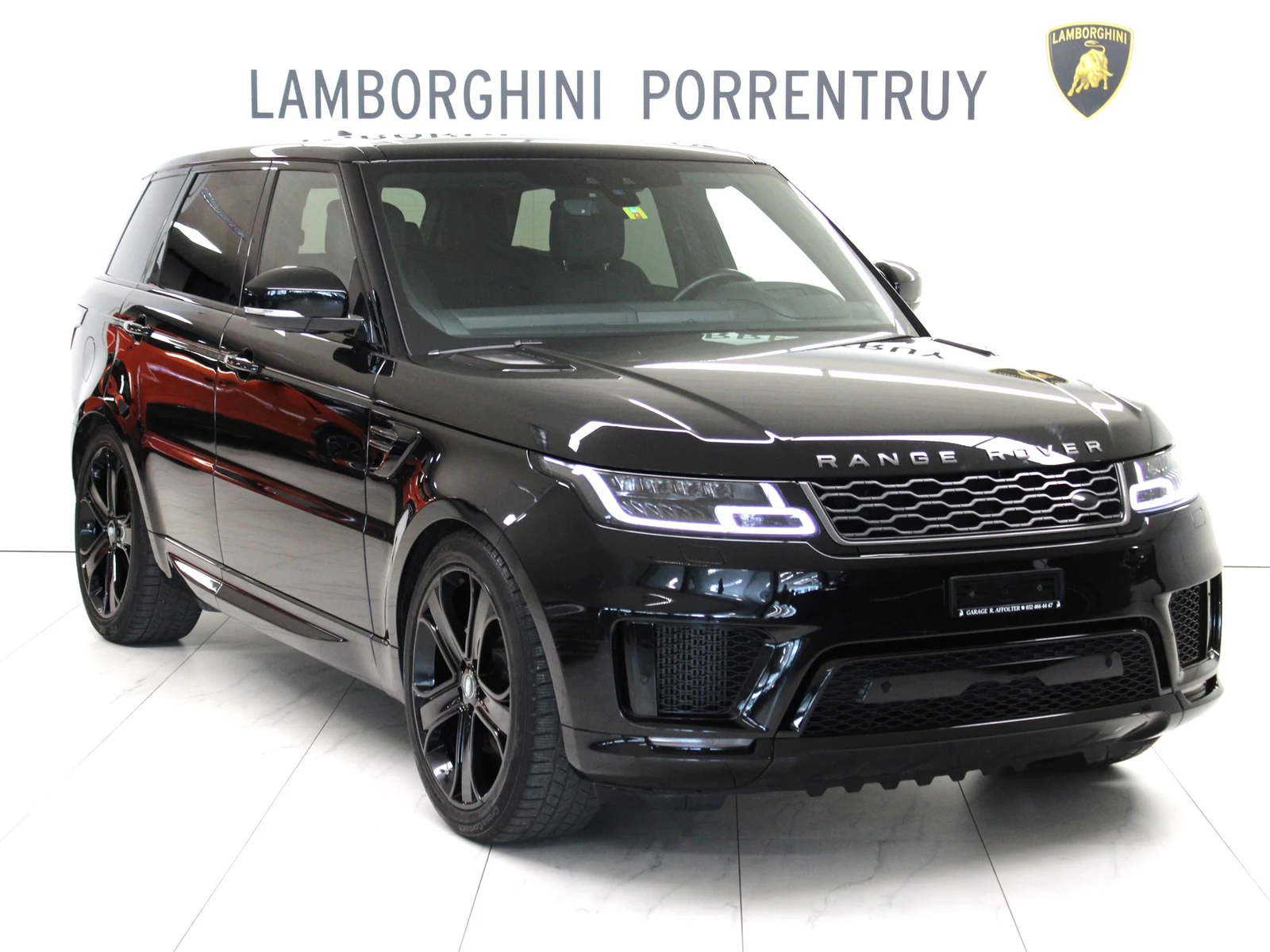 Black Land Rover Range Rover Sport SDV8 HSE Dynamic, full front three-quarter view