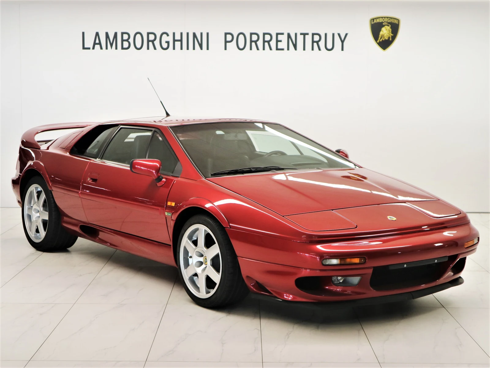 Burgundy Lotus Esprit V8 GT, full front three-quarter view