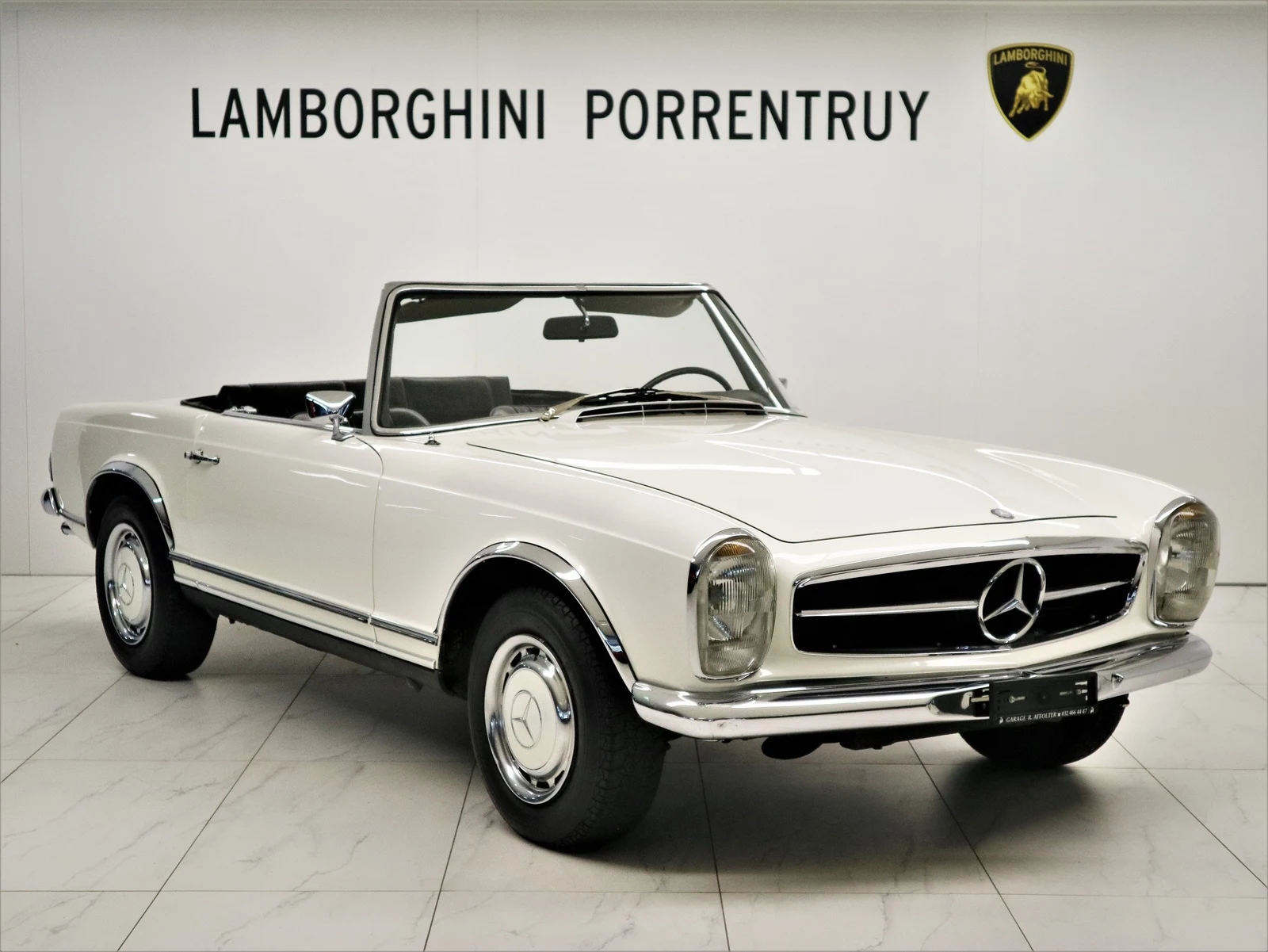 White Mercedes-Benz 280 SL California (W113), full front three-quarter view