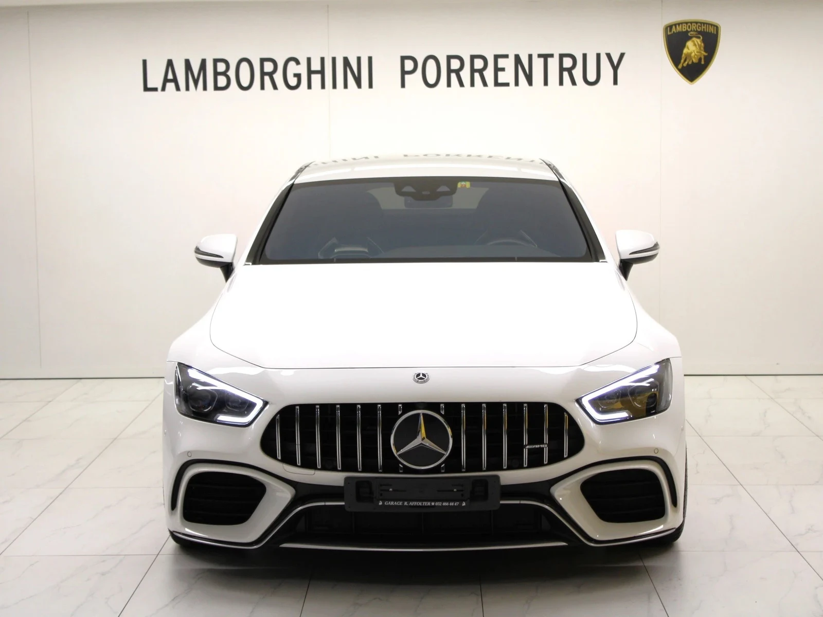 White Mercedes-AMG GT 63 S 4MATIC+ 4-Door Coupé, full front view