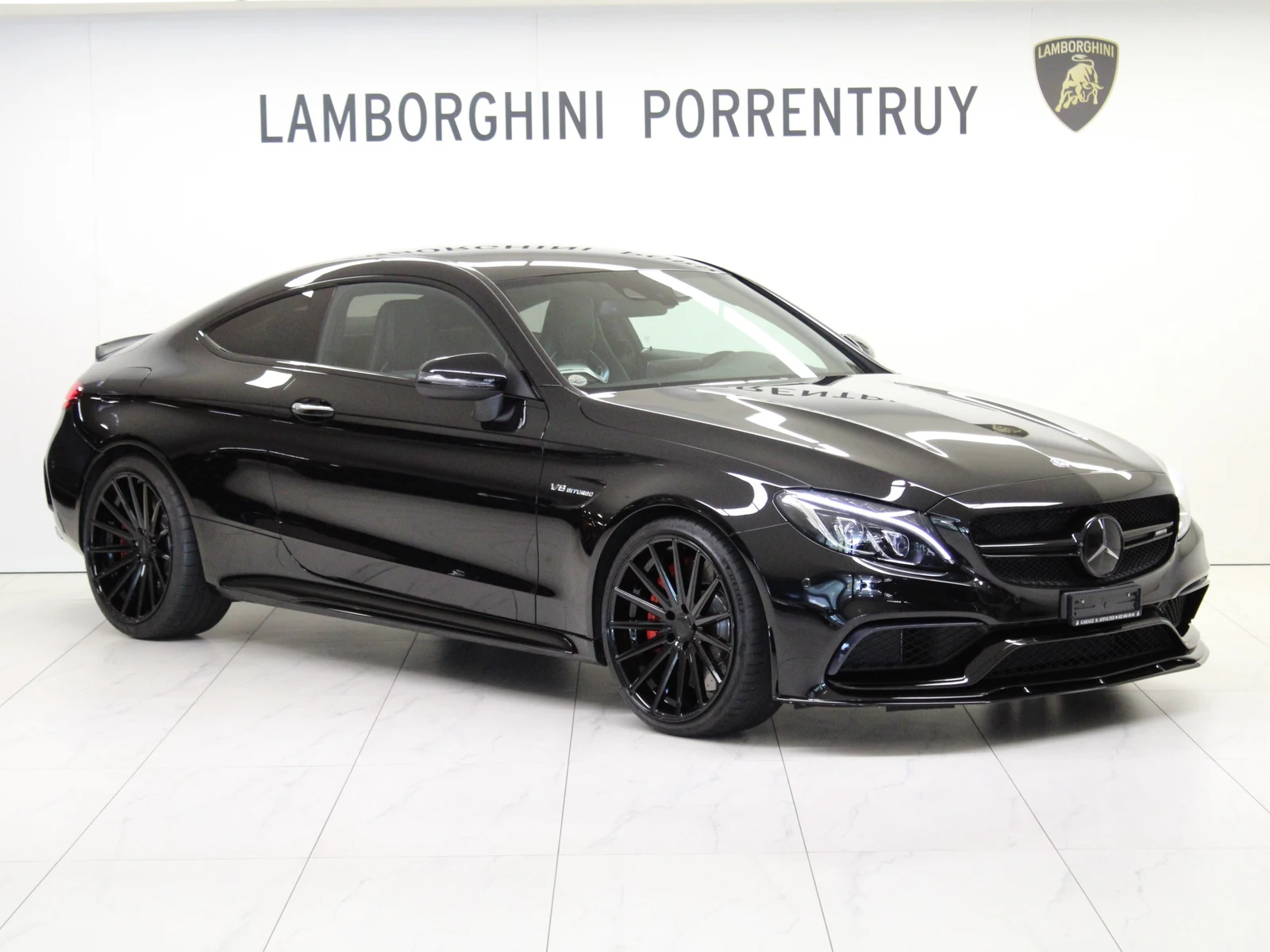 Black Mercedes-AMG C 63 S Coupé Edition 1 (C205), full front three-quarter view