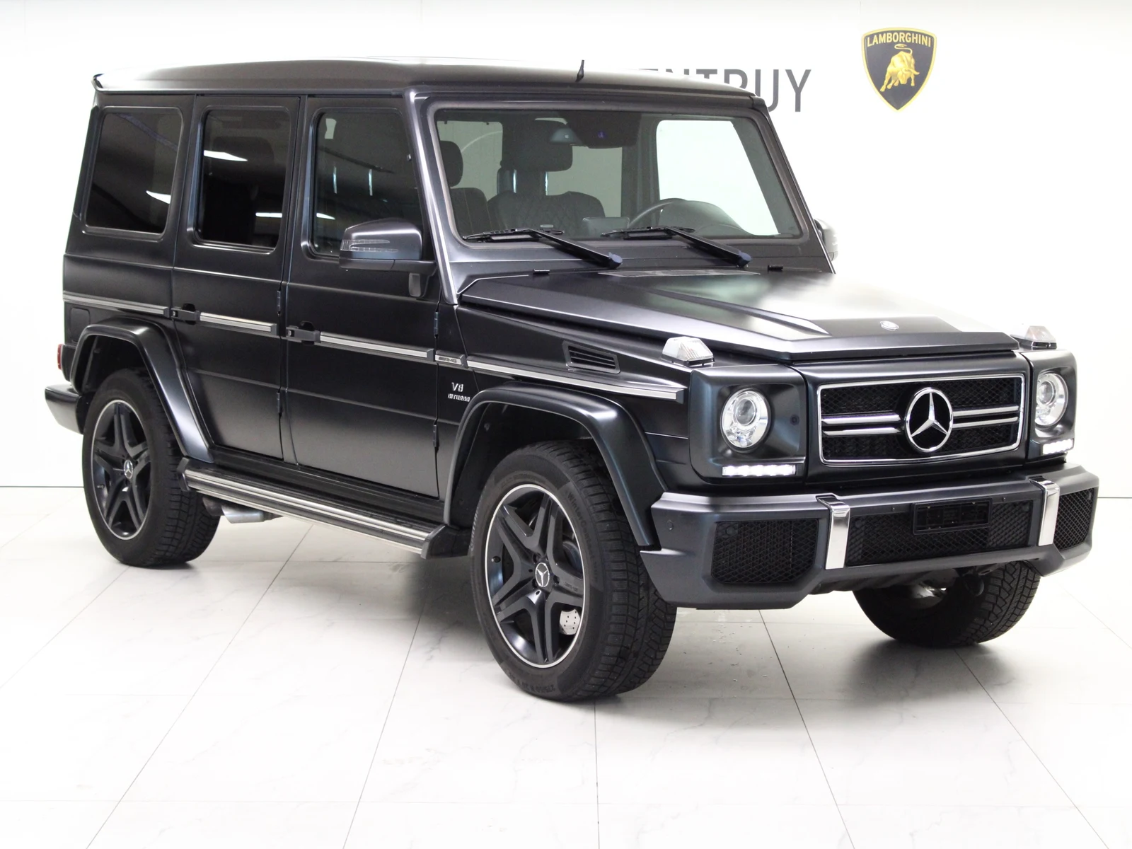 Black Mercedes-AMG G 63 (W463), full front three-quarter view