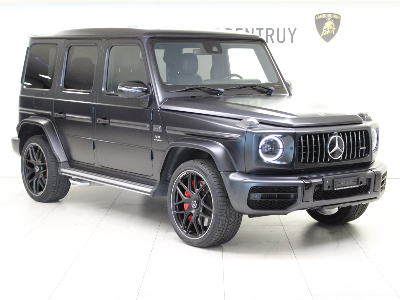 Black Mercedes-AMG G 63 (W463), full front three-quarter view