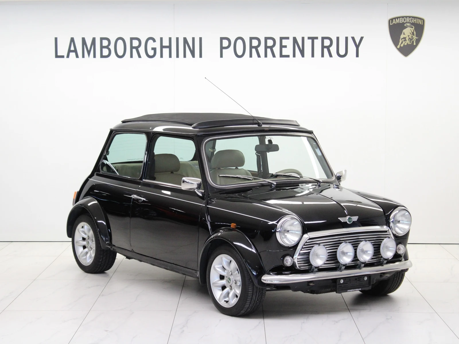 Black Mini Knightsbridge 1.3 Swiss Final Edition, full front three-quarter view