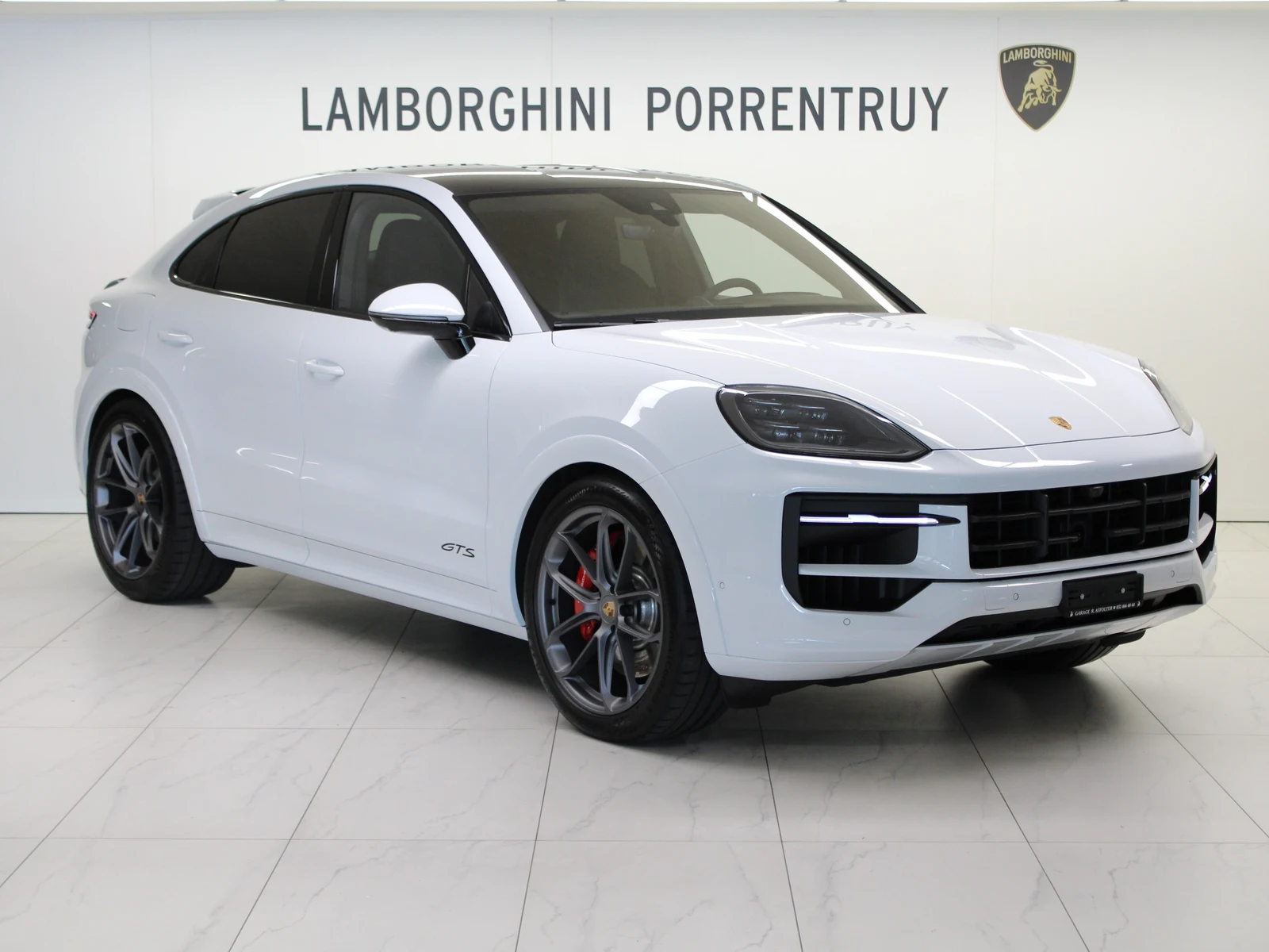 White Porsche Cayenne GTS Coupé, full front three-quarter view
