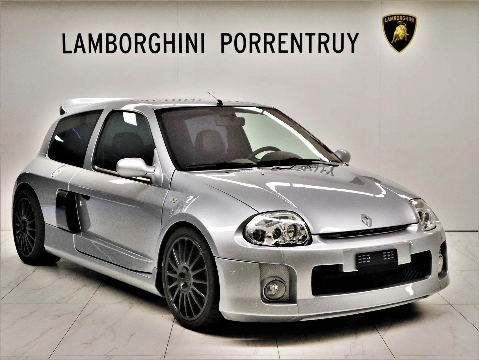 Gray Renault Clio V6, full front three-quarter view