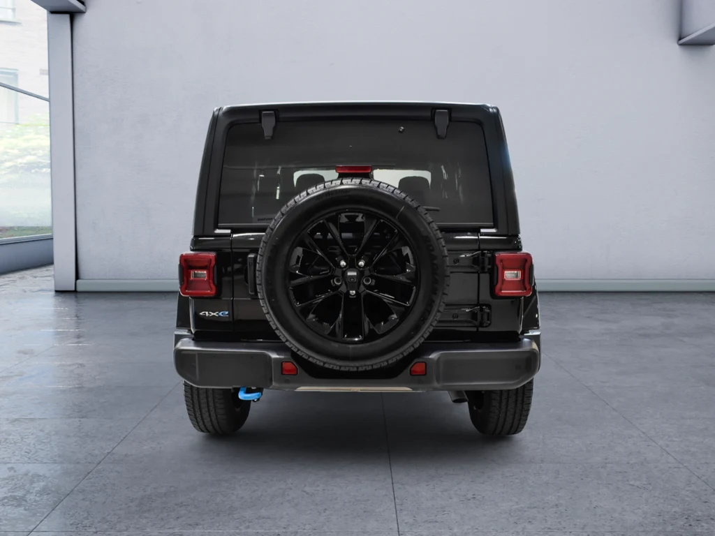 2024 Jeep Wrangler Sahara 4xe, rear three-quarter view, Black