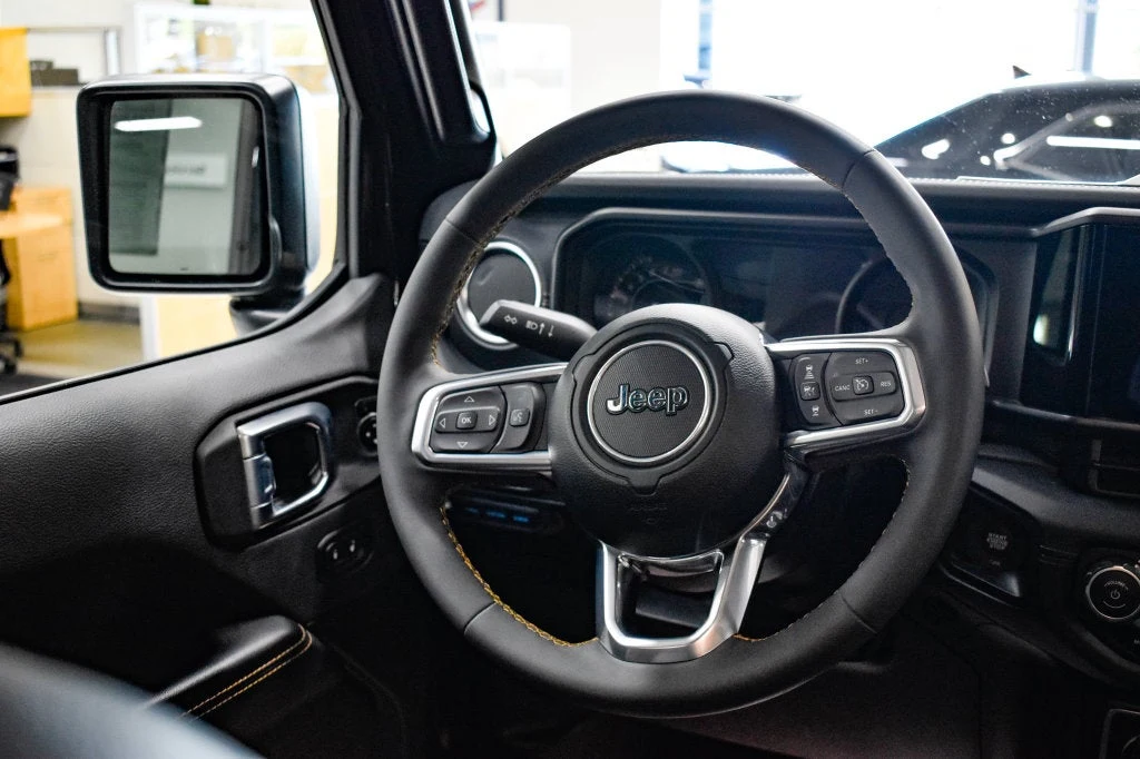 2024 Jeep Wrangler Sahara 4xe interior, steering wheel, Black