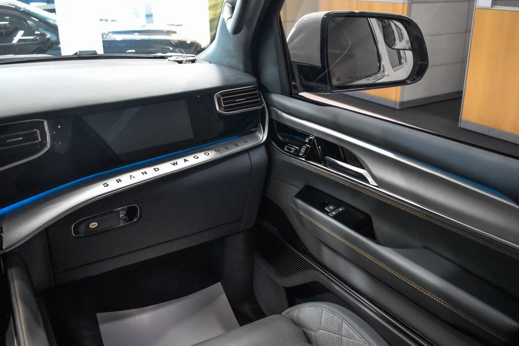 2022 Jeep Grand Wagoneer Series III interior, door panel, Blue Agave