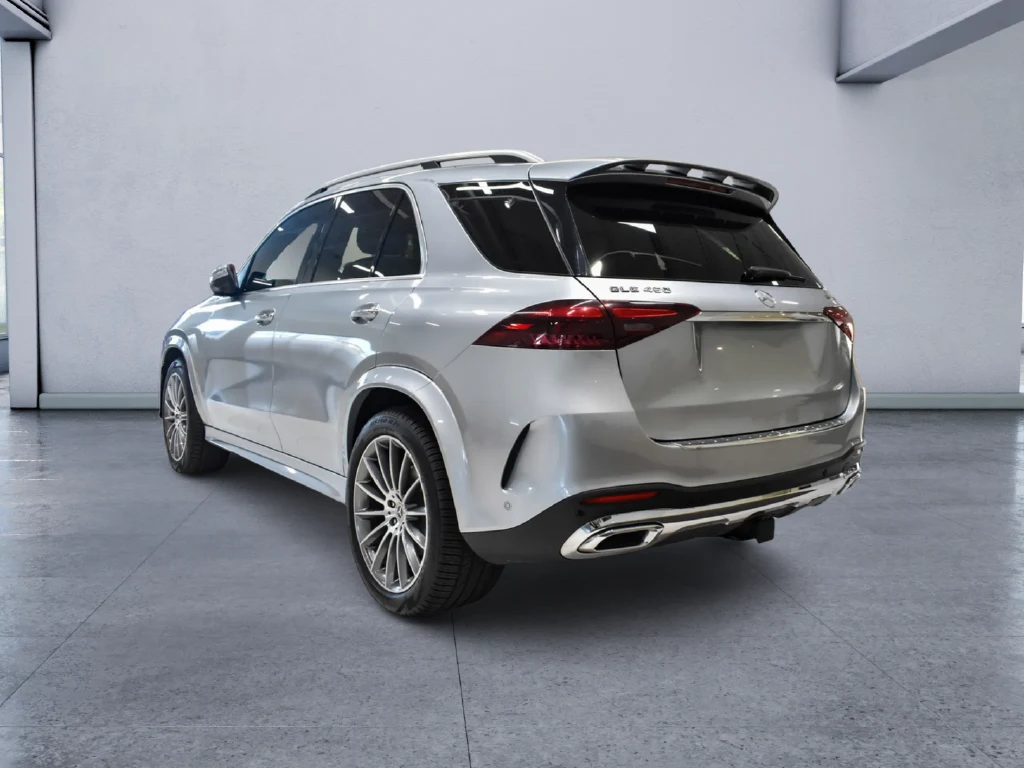2024 Mercedes-Benz GLE 450 4MATIC, rear three-quarter view, Silver