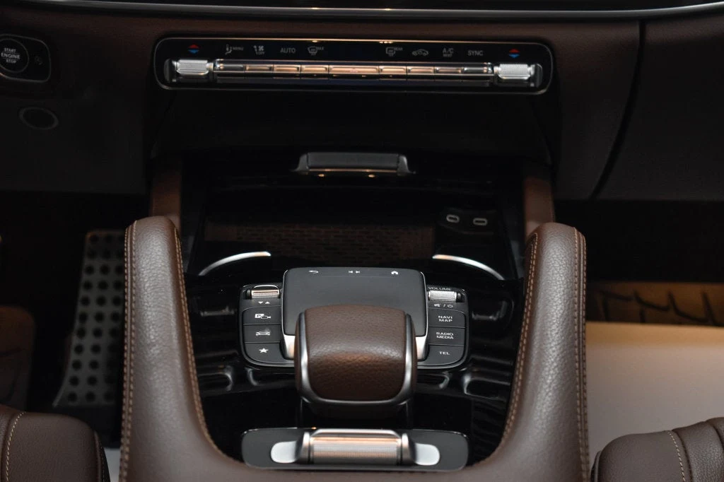 2024 Mercedes-Benz GLS 450 4MATIC interior, center console, Bahia Brown/Black