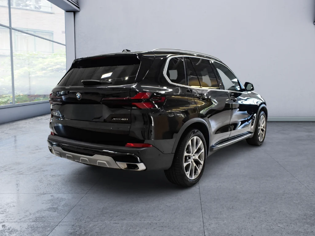 2026 BMW X5 xDrive40i, rear three-quarter view, Black