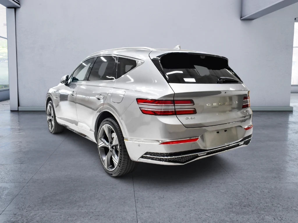2026 Genesis GV80 3.5T Prestige, rear three-quarter view, Silver