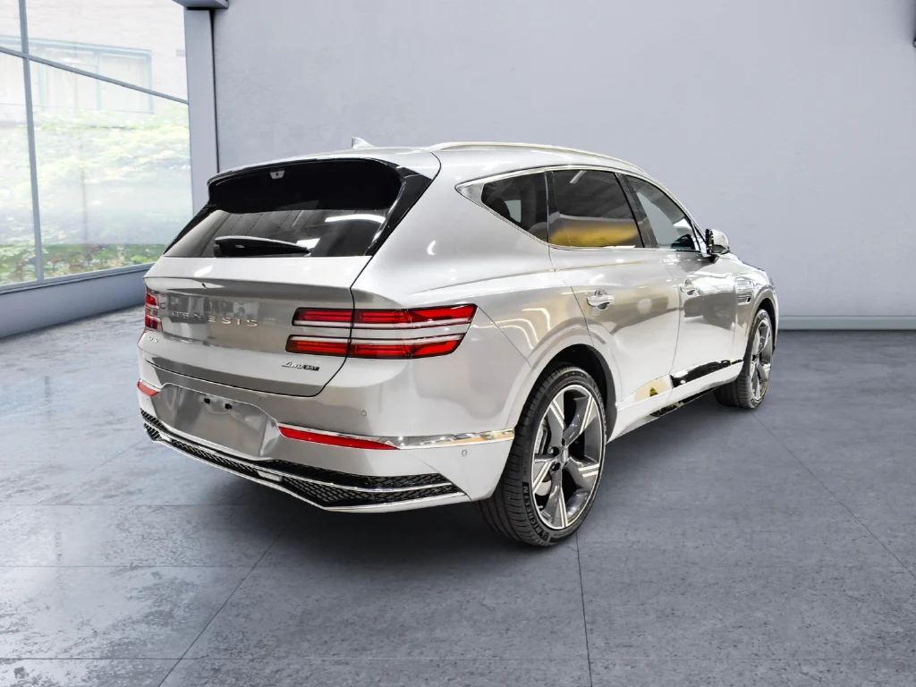 2026 Genesis GV80 3.5T Prestige, rear three-quarter view, Silver