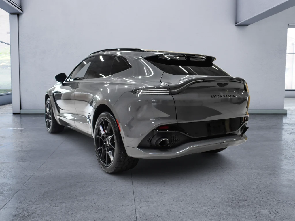 2022 Aston Martin DBX, rear three-quarter view, Grey