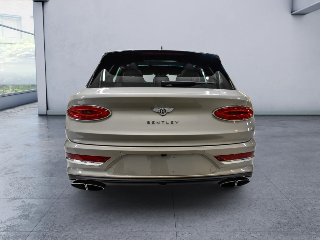 2023 Bentley Bentayga Azure V8, rear three-quarter view, White
