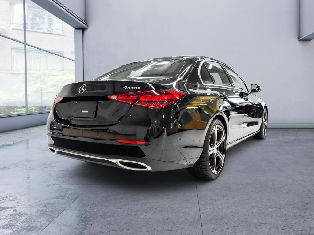 2026 Mercedes-Benz C 300 4MATIC Sedan, rear three-quarter view, Black