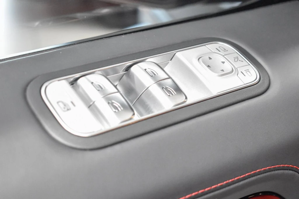 2025 Mercedes-AMG G 63 interior, center console, Red Pepper/Black