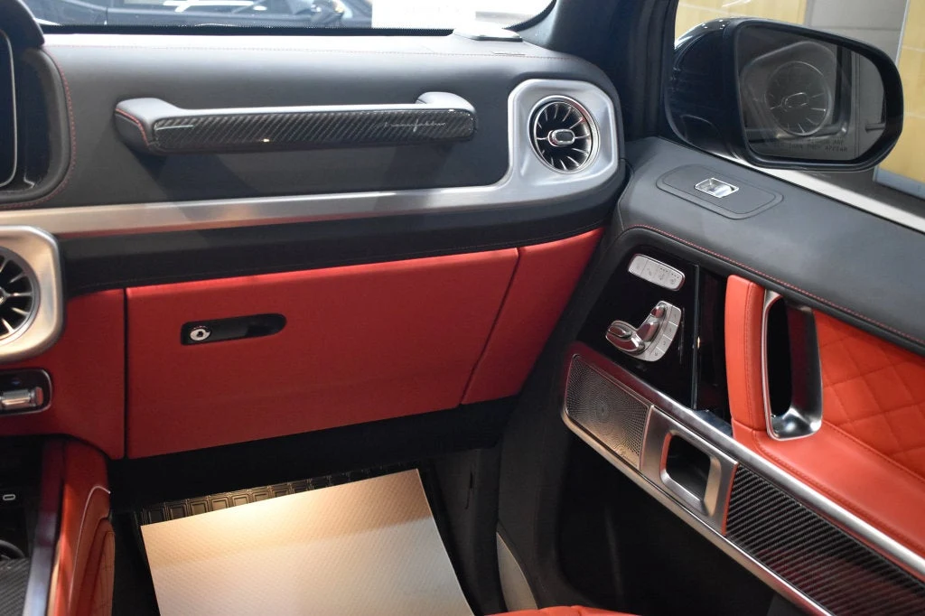 2025 Mercedes-AMG G 63 interior, door panel, Red Pepper/Black