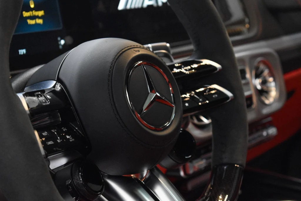 2025 Mercedes-AMG G 63 interior, steering wheel, Red Pepper/Black