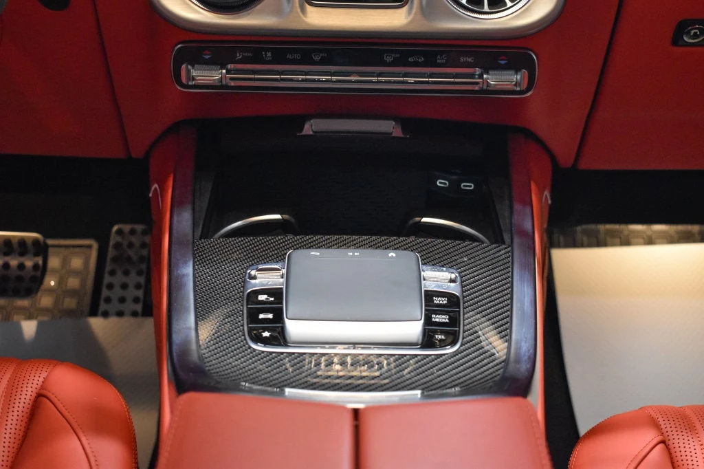 2025 Mercedes-AMG G 63 interior, center console, Red Pepper/Black
