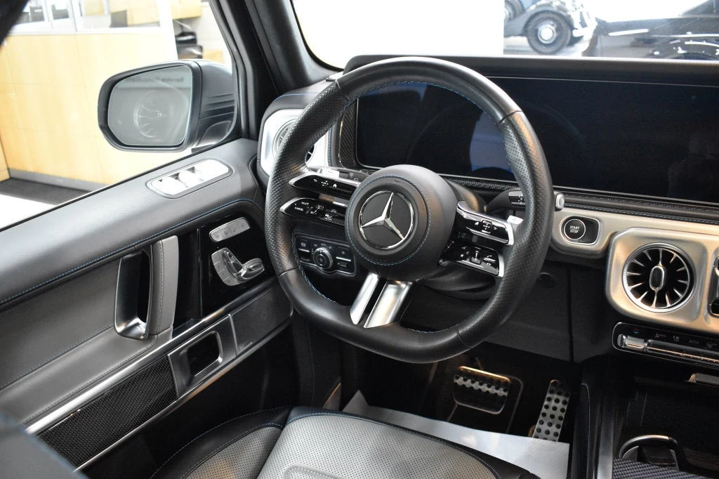 2025 Mercedes-Benz G 580 with EQ Technology interior, dashboard, Silver Pearl/Black