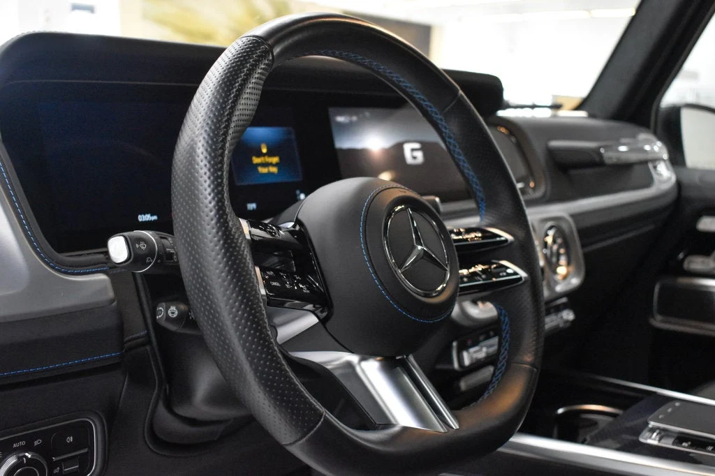 2025 Mercedes-Benz G 580 with EQ Technology interior, steering wheel, Silver Pearl/Black