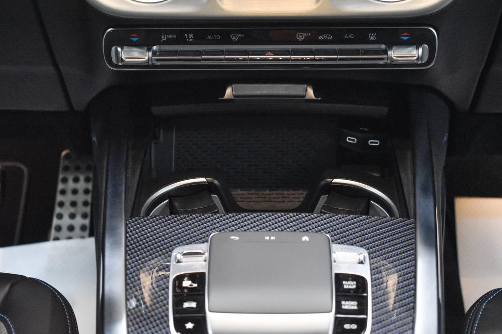 2025 Mercedes-Benz G 580 with EQ Technology interior, center console, Silver Pearl/Black