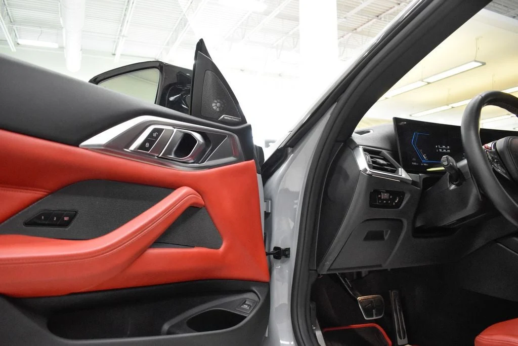 2024 BMW M4 Competition Convertible interior, door panel, Fiona Red/Black