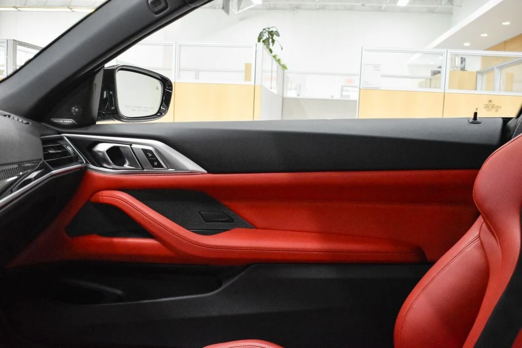 2024 BMW M4 Competition Convertible interior, door panel, Fiona Red/Black