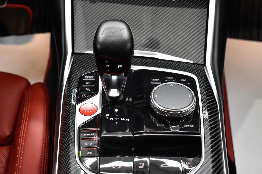 2024 BMW M4 Competition Convertible interior, center console, Fiona Red/Black