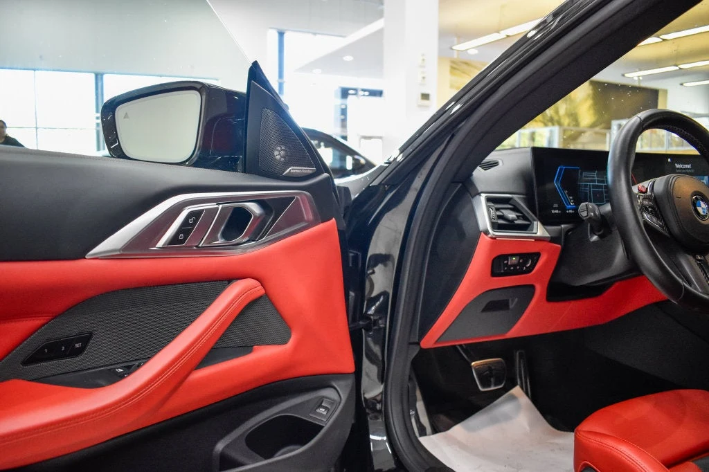 2024 BMW M4 Competition interior, door panel, Fiona Red/Black