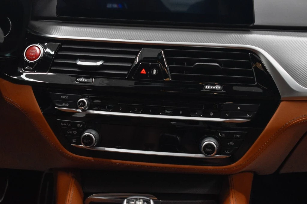 2019 BMW M5 Competition interior, center console, Aragon Brown